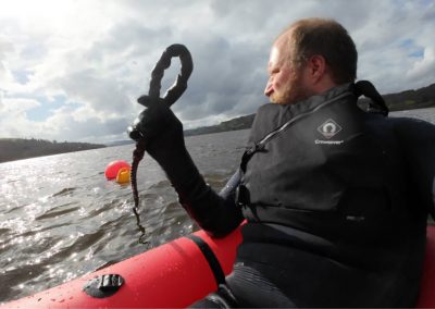 Checking my mooring onboard Tadpole, my Biluta Packraft